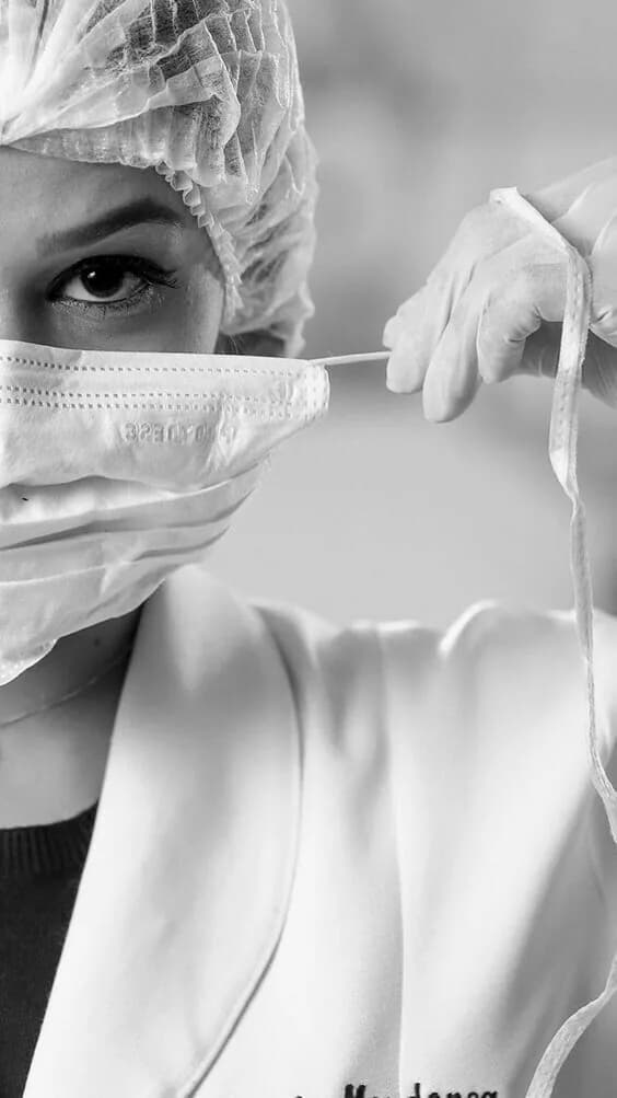 Healthcare professional preparing for patient care